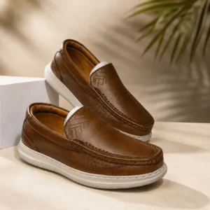 Men's brown slip-on loafers with white sole