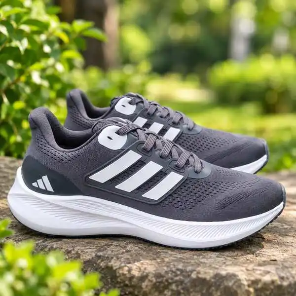 Adidas men's grey running shoes with silver stripes and white sole